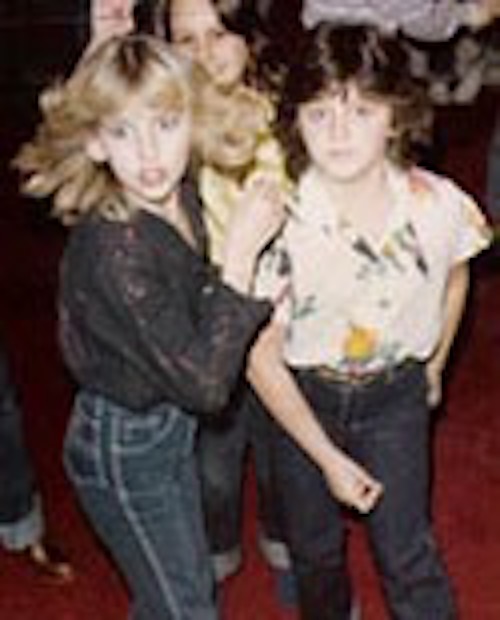 Patty as a young girl dancing with friend at 13 birthday party